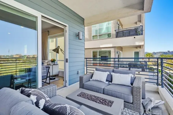 a view of a balcony with an ocean view