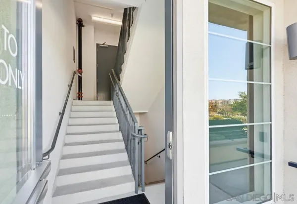 a view of a swimming pool with a table and chairs