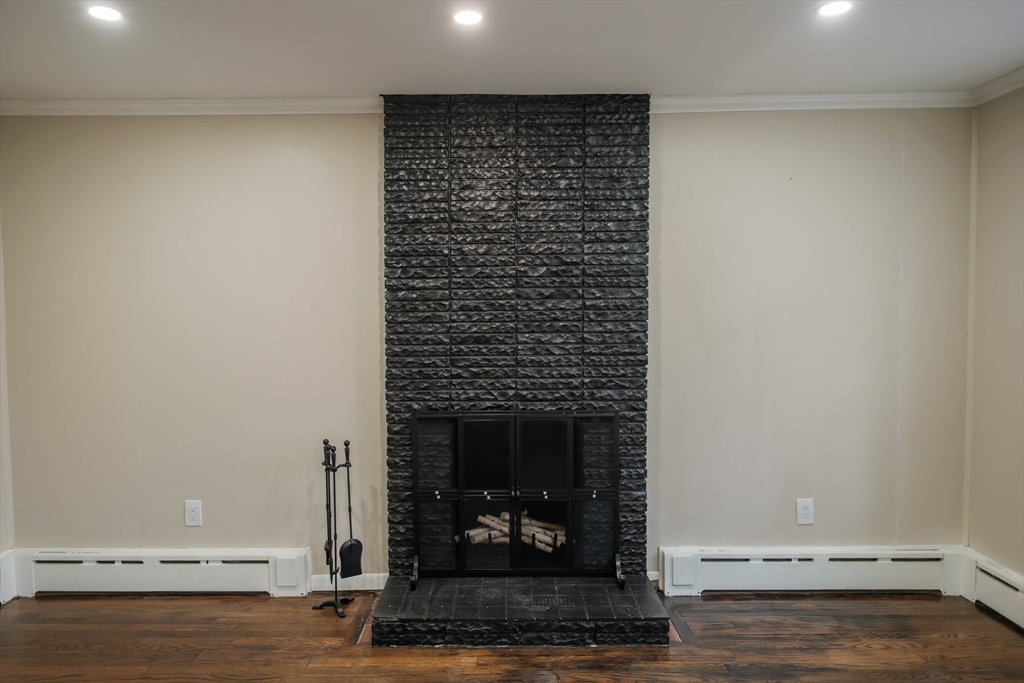 181 Freeman Terrace Springfield, MA 01104 - Photo 17 of 37 a room with a fireplace