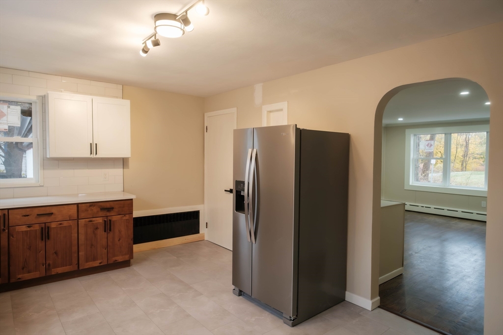 181 Freeman Terrace Springfield, MA 01104 - Photo 23 of 37 a kitchen with stainless steel appliances granite countertop a refrigerator and a sink
