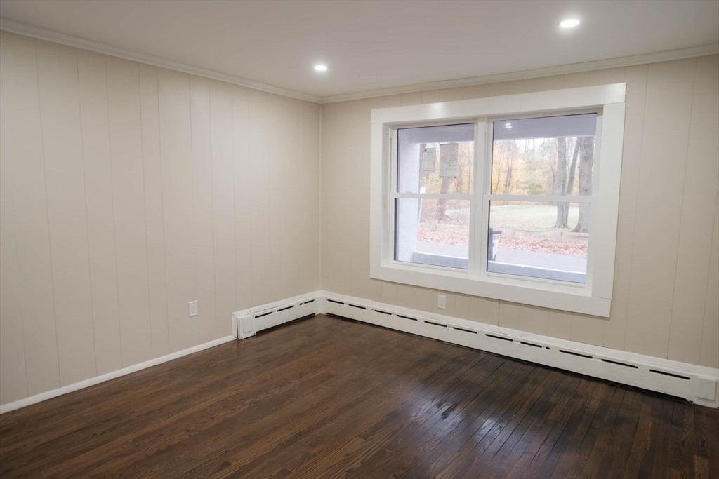181 Freeman Terrace Springfield, MA 01104 - Photo 32 of 37 wooden floor in an empty room with a window