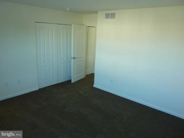 an empty room with a door