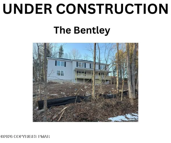 a black and white photo of a sign board