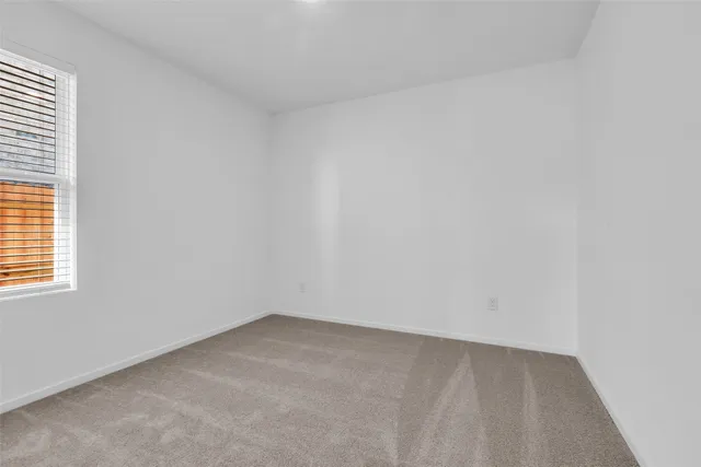 an empty room with a window