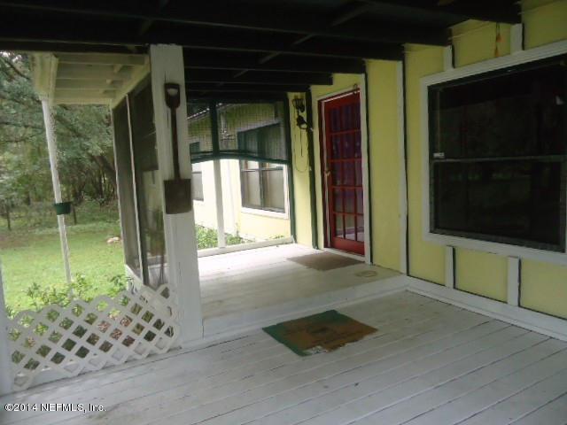 113 Rhododendron Lane Interlachen, FL 32148 - Photo 2 of 14 screened front porch