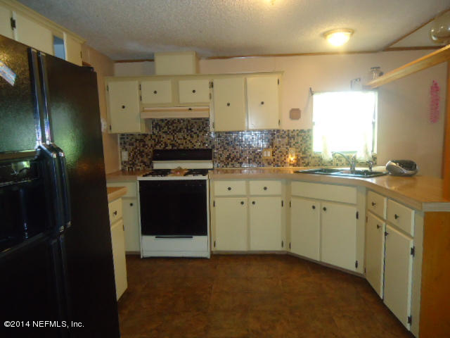 113 Rhododendron Lane Interlachen, FL 32148 - Photo 5 of 14 spacious kitchen includes appliances