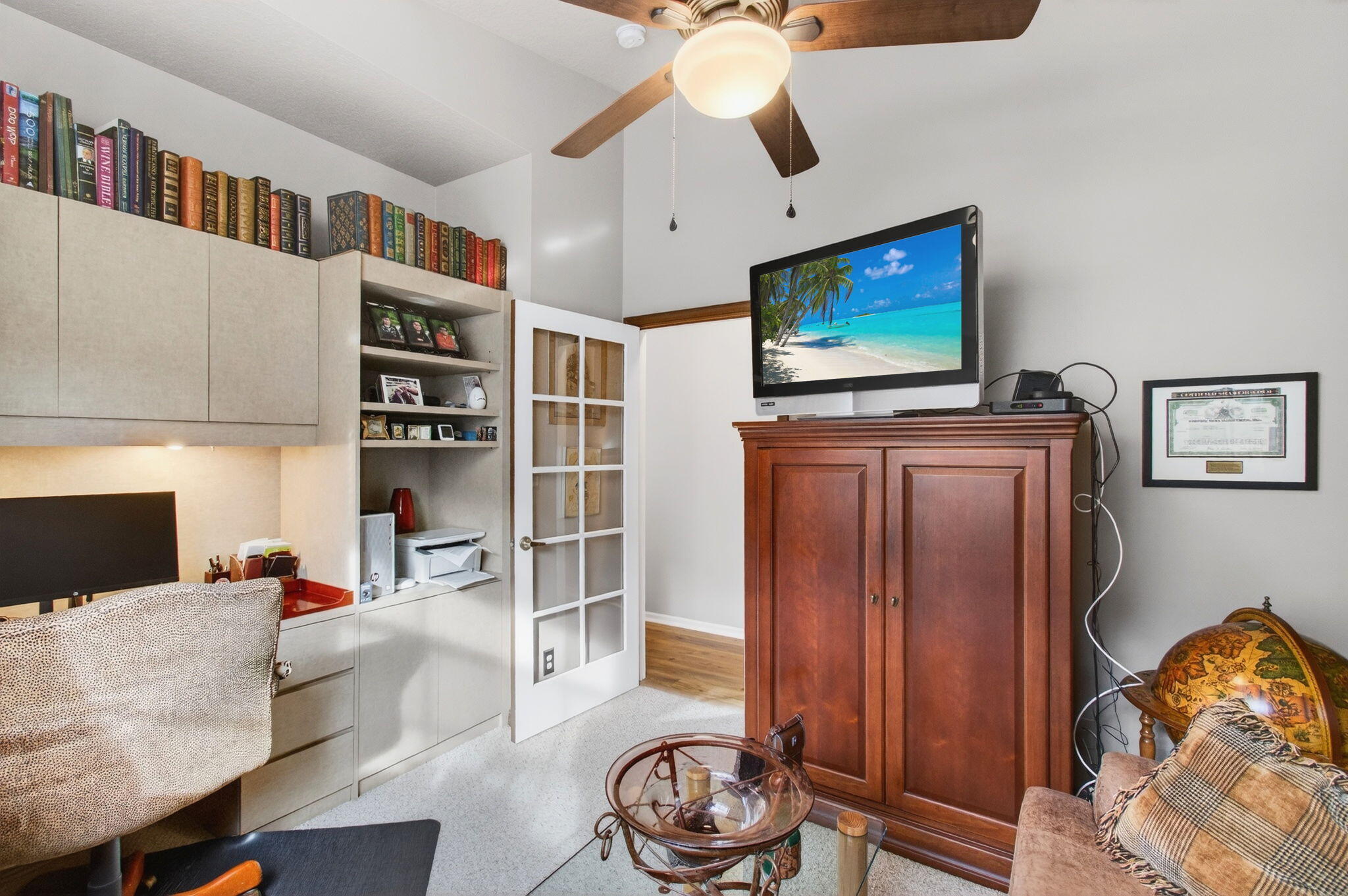 6253 Heliconia Road Delray Beach, FL 33484 - Photo 43 of 85 a living room with furniture and a flat screen tv