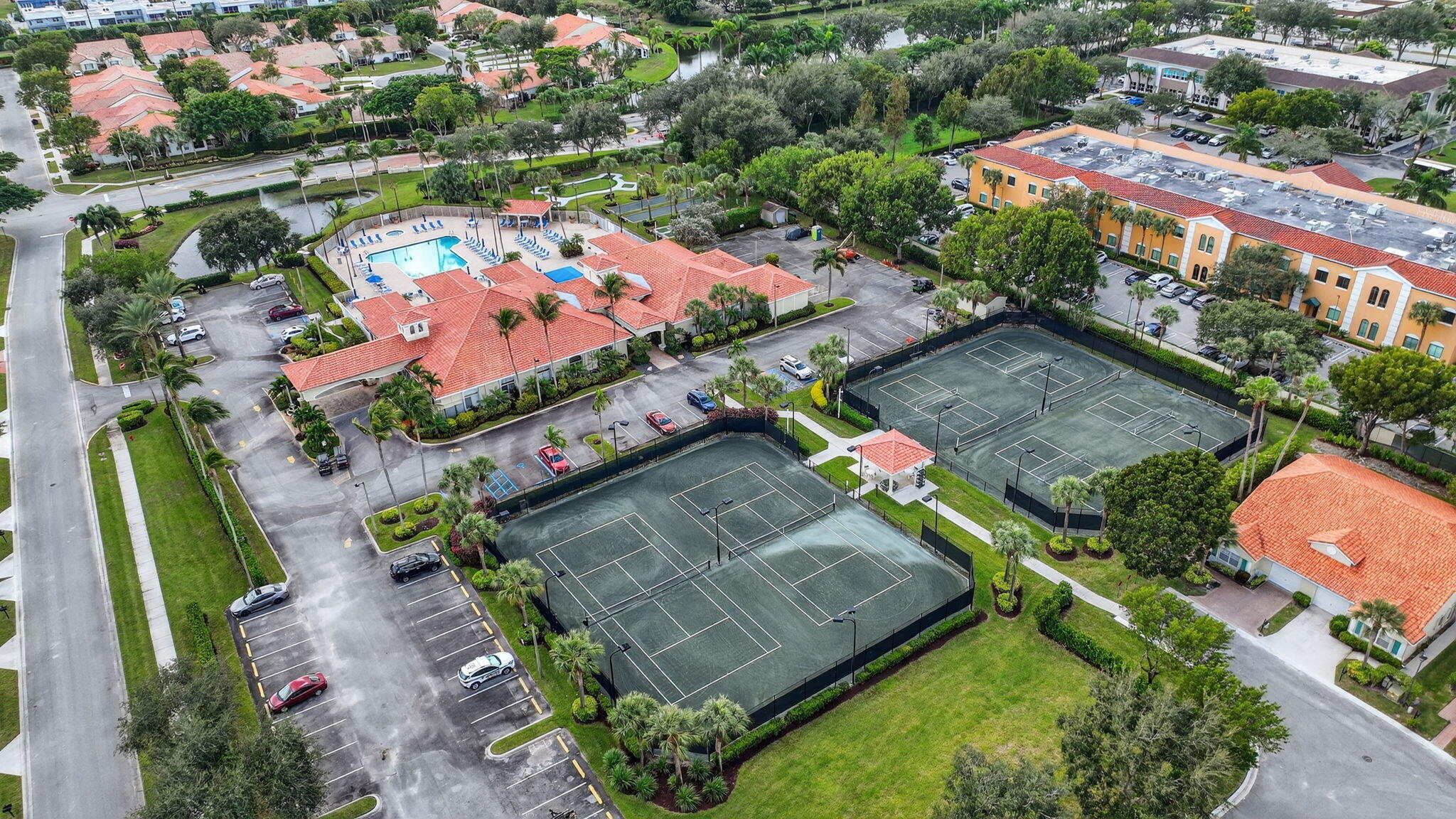 6253 Heliconia Road Delray Beach, FL 33484 - Photo 46 of 85 an aerial view of a swimming pool patio and outdoor seating