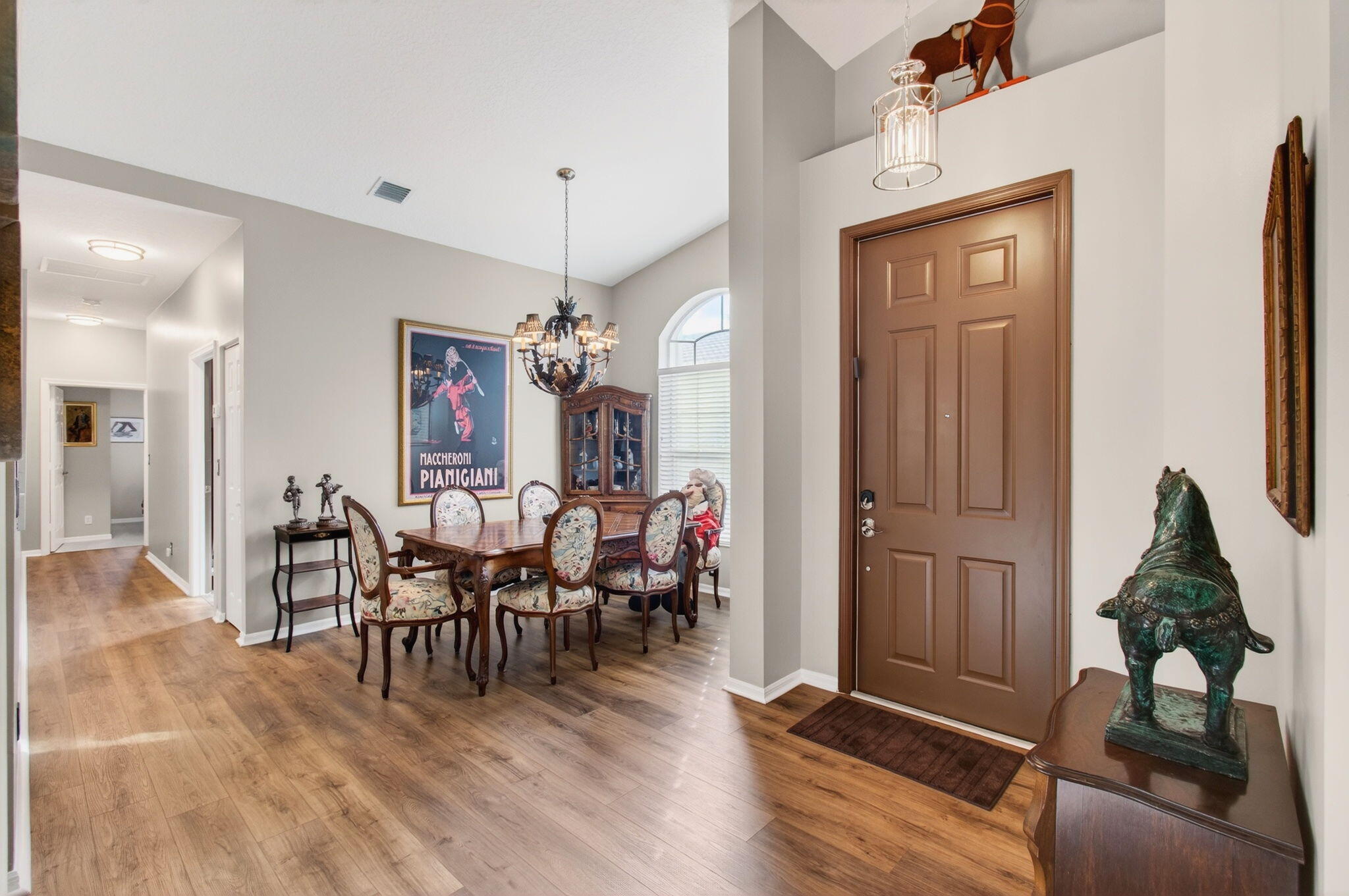 6253 Heliconia Road Delray Beach, FL 33484 - Photo 7 of 85 a view of a dining room with furniture window and wooden floor