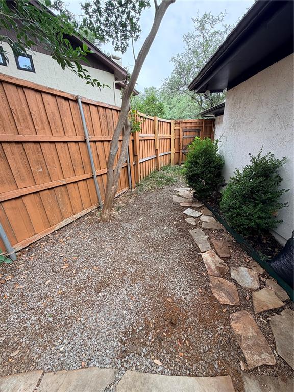5045 Thunder Road Dallas, TX 75244 - Photo 27 of 28 a view of a backyard