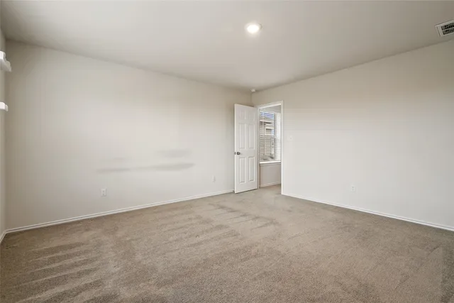 an empty room with an entryway