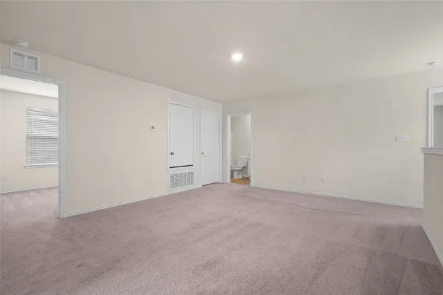 an empty room with an entryway