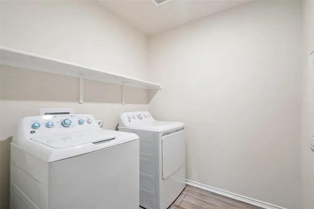 a utility room with dryer and washer