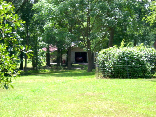 720 Turner Woods Road Gray, GA 31032 - Photo 22 of 22 a view of a house with swimming pool