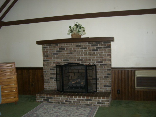 720 Turner Woods Road Gray, GA 31032 - Photo 4 of 22 a living room with fireplace