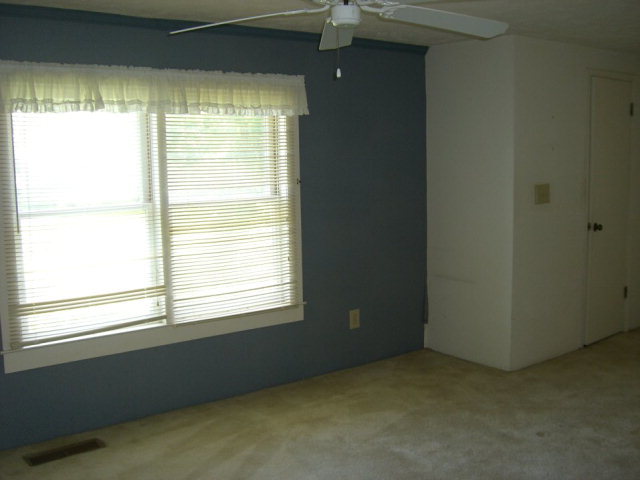 720 Turner Woods Road Gray, GA 31032 - Photo 10 of 22 a view of an empty room with a window