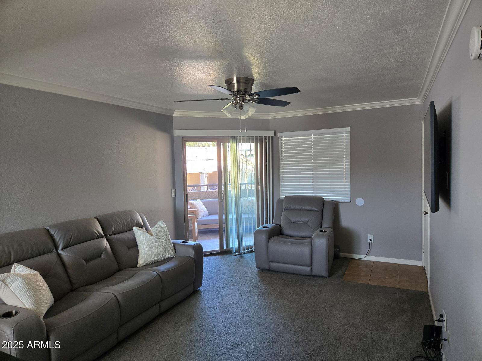 1720 East Thunderbird Road, Unit 2015 Phoenix, AZ 85022 - Photo 7 of 25 a living room with furniture and a window