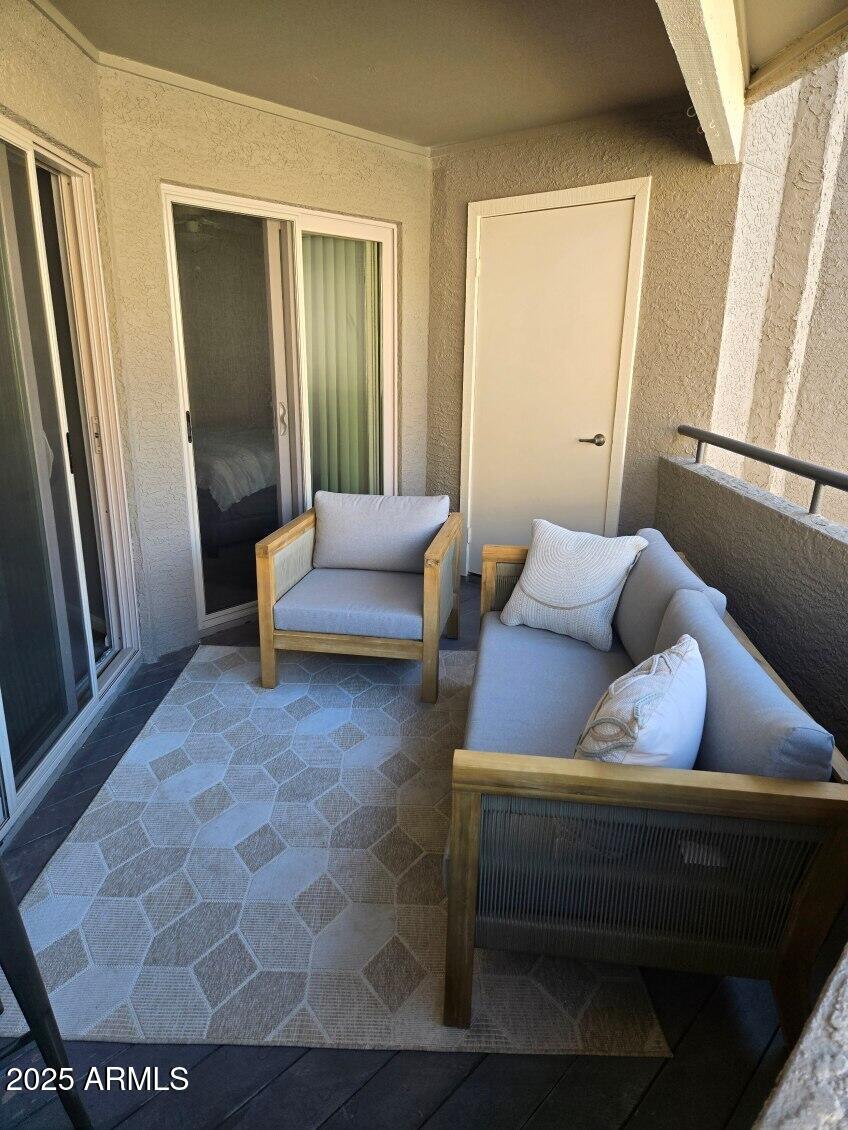 1720 East Thunderbird Road, Unit 2015 Phoenix, AZ 85022 - Photo 9 of 25 a living room with furniture and a window