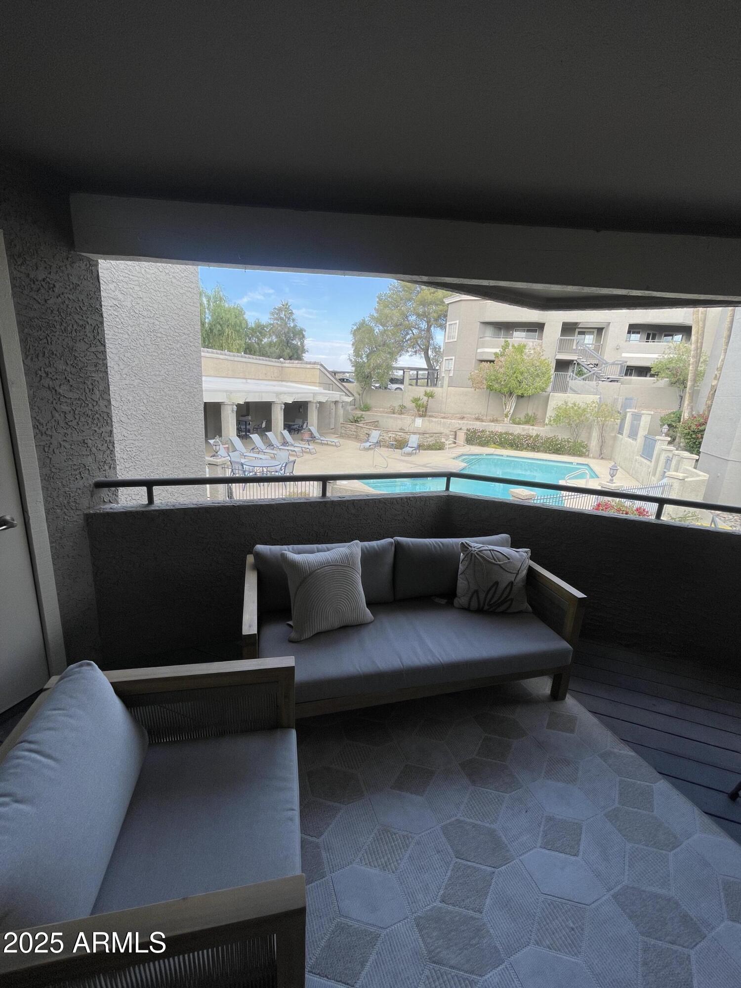 1720 East Thunderbird Road, Unit 2015 Phoenix, AZ 85022 - Photo 10 of 25 a view of a living room with furniture