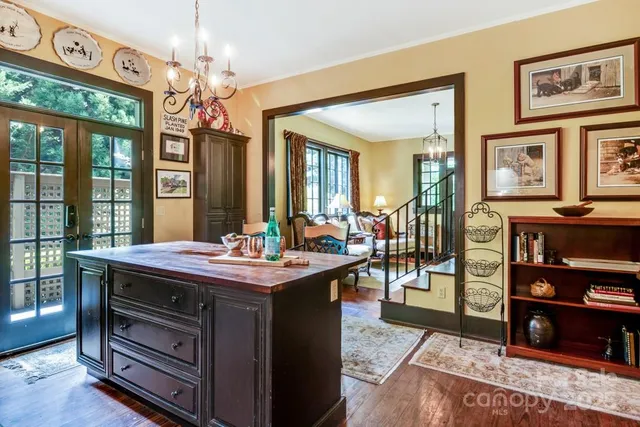 a view of hall way with furniture