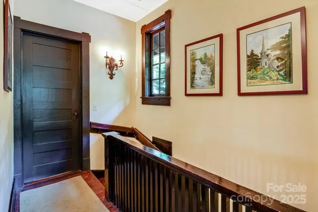 a view of hallway with stairs