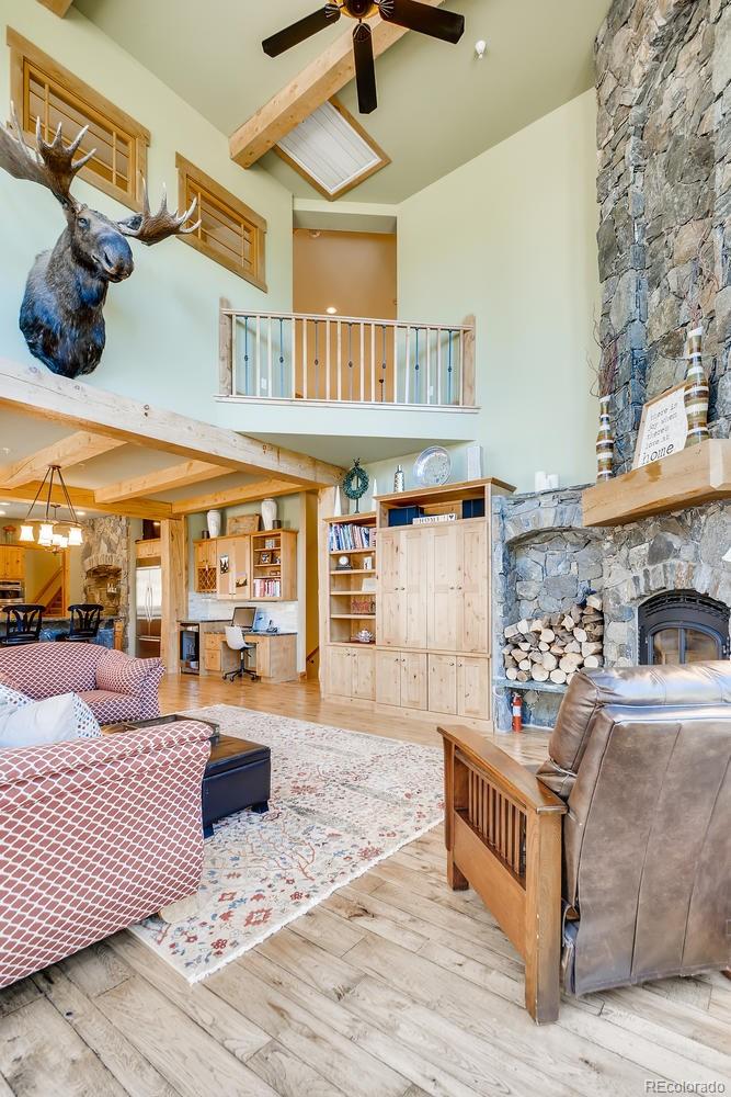 150 Outpost Lane Evergreen, CO 80439 - Photo 9 of 40 a outdoor space with lots of table and chairs