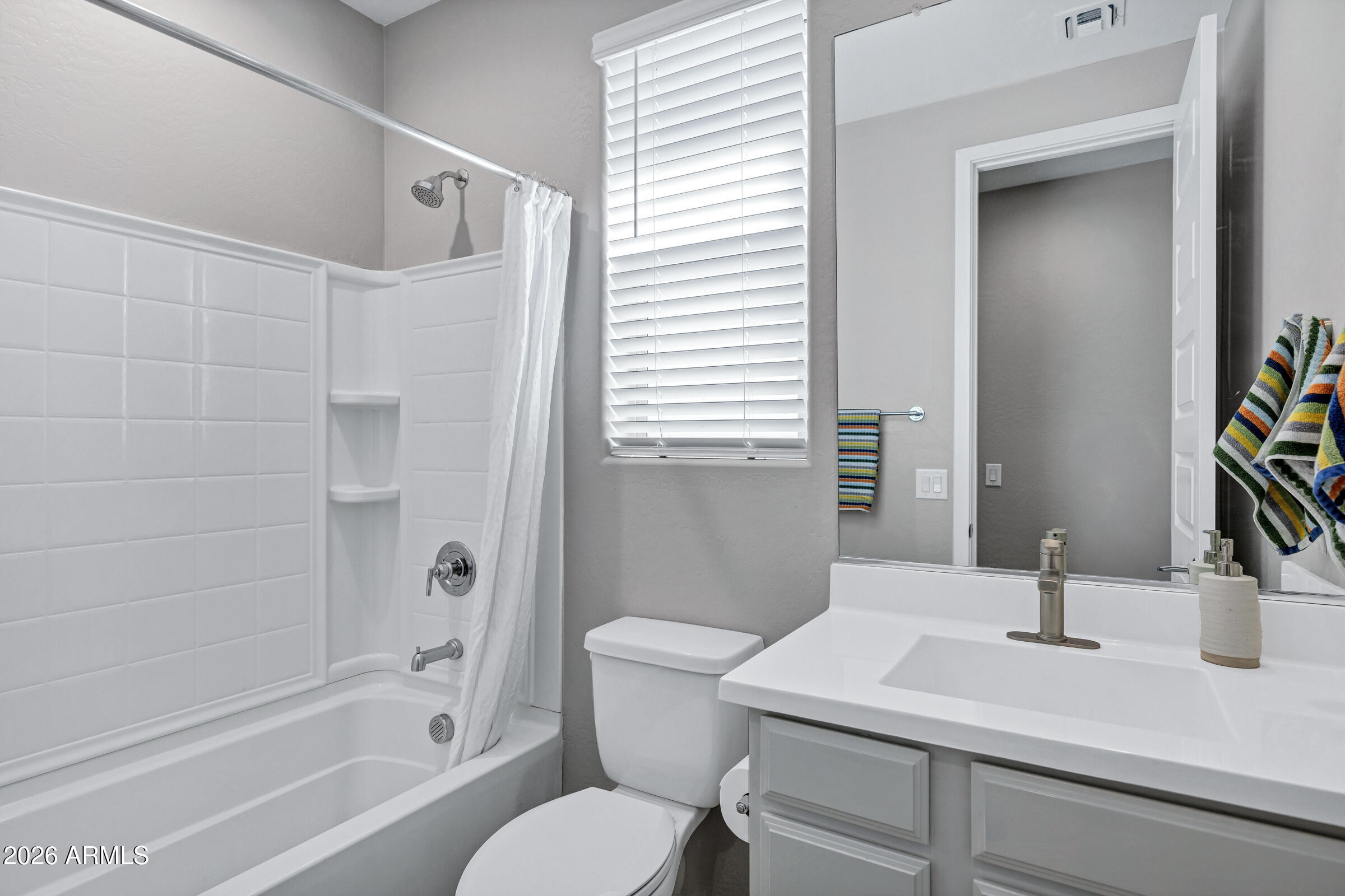 12243 East Sereno Road Gold Canyon, AZ 85118 - Photo 24 of 37 a bathroom with a sink a toilet and shower