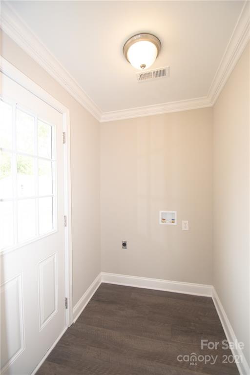 1609 Memorial Park Road Lancaster, SC 29720 - Photo 14 of 15 an empty room with wooden floor and windows