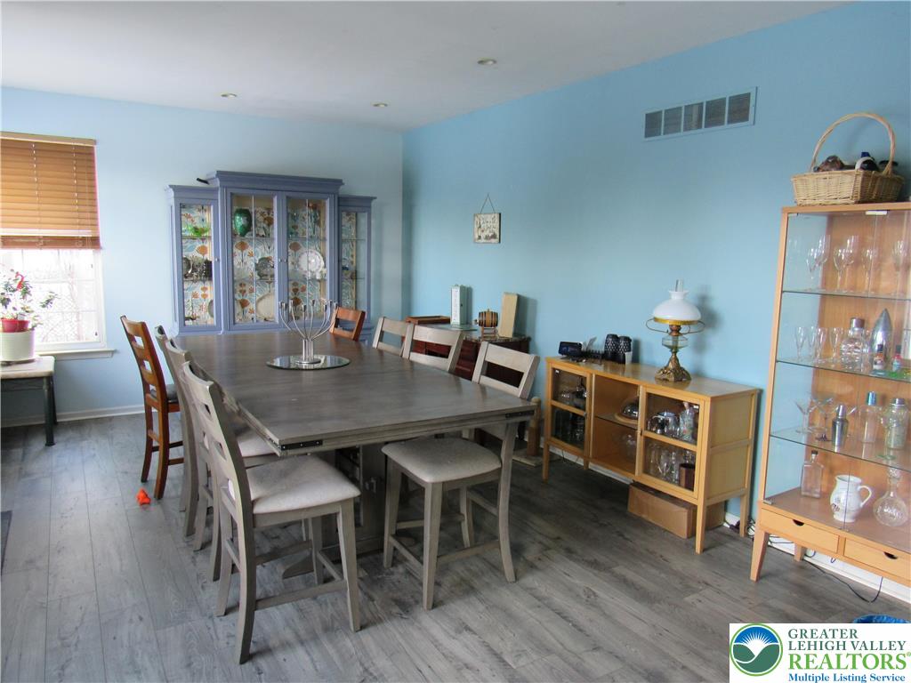 17 Wilt Road Bechtelsville, PA 19505 - Photo 14 of 38 a view of a dining room with furniture and wooden floor