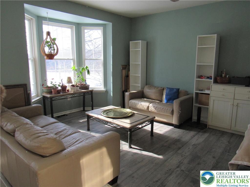 17 Wilt Road Bechtelsville, PA 19505 - Photo 16 of 38 a living room with furniture and a large window