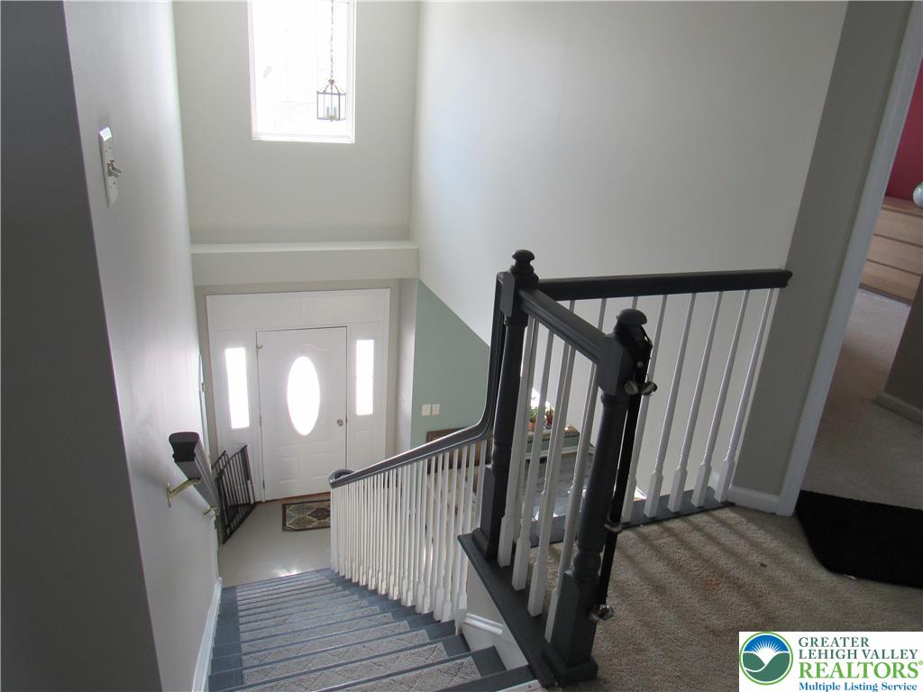 17 Wilt Road Bechtelsville, PA 19505 - Photo 22 of 38 a view of a hallway with wooden floor and stairs