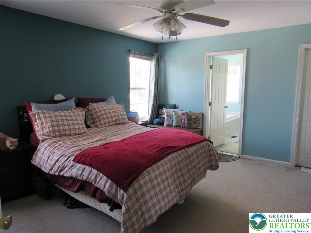 17 Wilt Road Bechtelsville, PA 19505 - Photo 25 of 38 a bedroom with a bed and window
