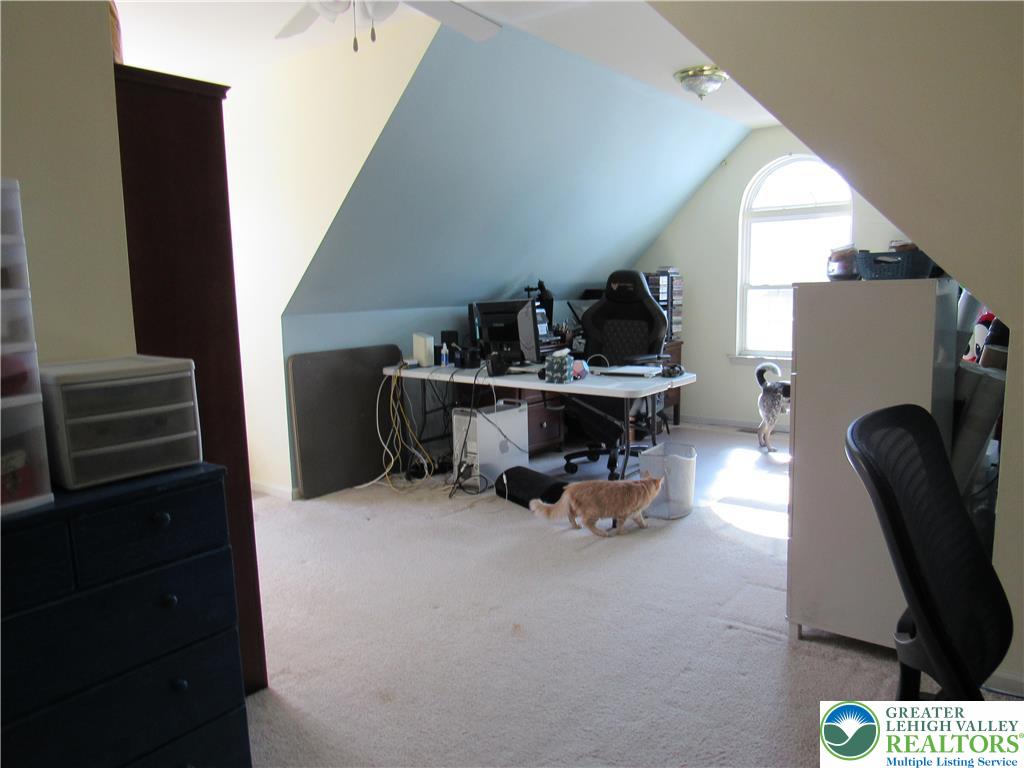 17 Wilt Road Bechtelsville, PA 19505 - Photo 32 of 38 a living room with furniture and a flat screen tv