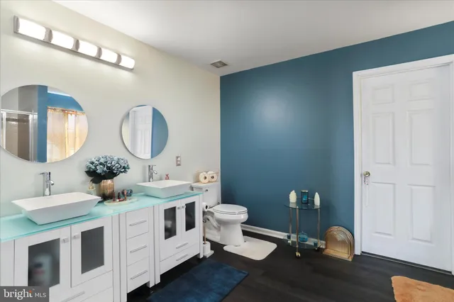 a bathroom with a tub and a shower