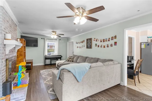 a living room with furniture and a table