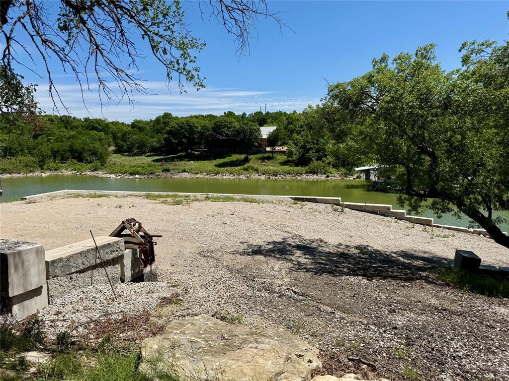 2007 Deep Water Road May, TX 76857 - Photo 26 of 40 a view of a lake with a yard