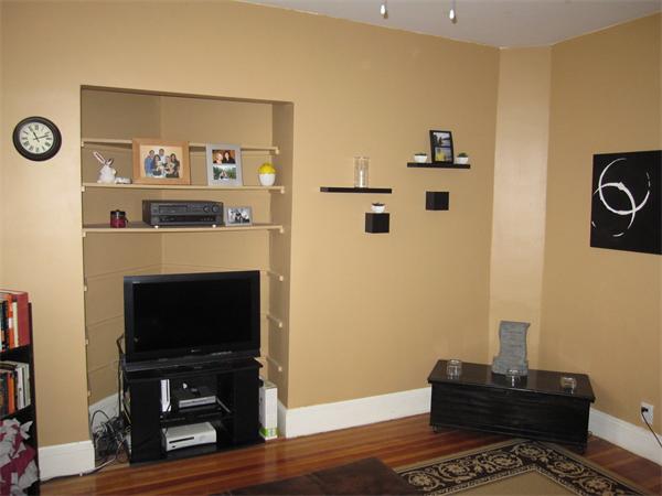 2 Colliston Road, Unit 4 Boston, MA 02135 - Photo 1 of 5 a living room with furniture and a flat screen tv