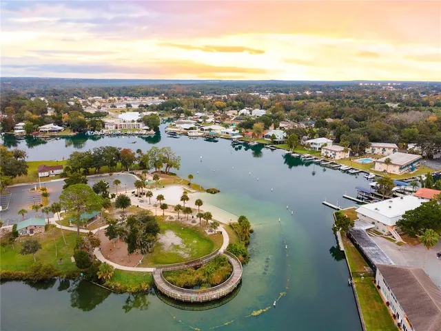 a view of a lake with a garden