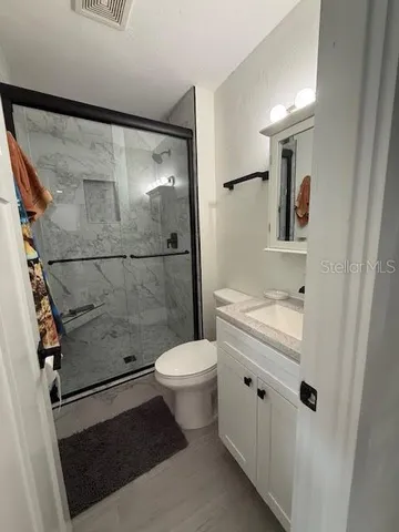 a view of a lake with a garden