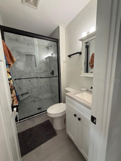 30 Southeast Valare Lane, Unit 102B Crystal River, FL 34429 - Photo 38 of 47 a bathroom with a sink and a mirror