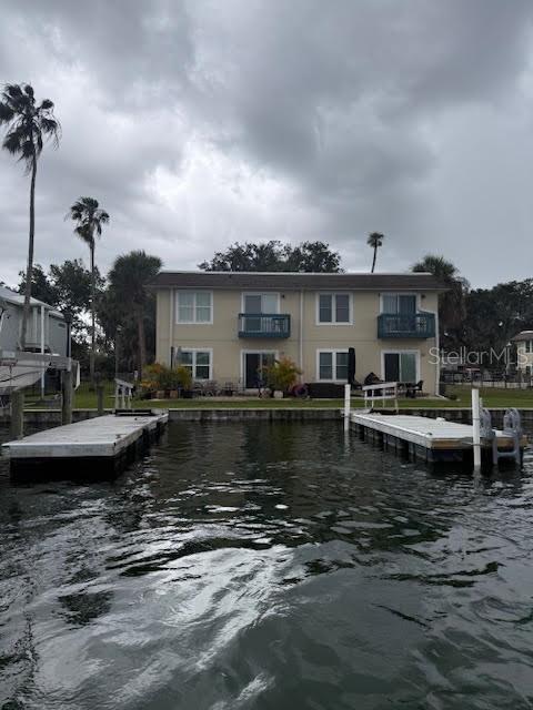 30 Southeast Valare Lane, Unit 102B Crystal River, FL 34429 - Photo 45 of 47 a view of a swimming pool with a patio