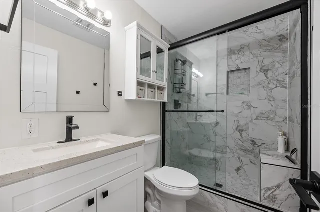 a front view of a house with a yard table and chairs