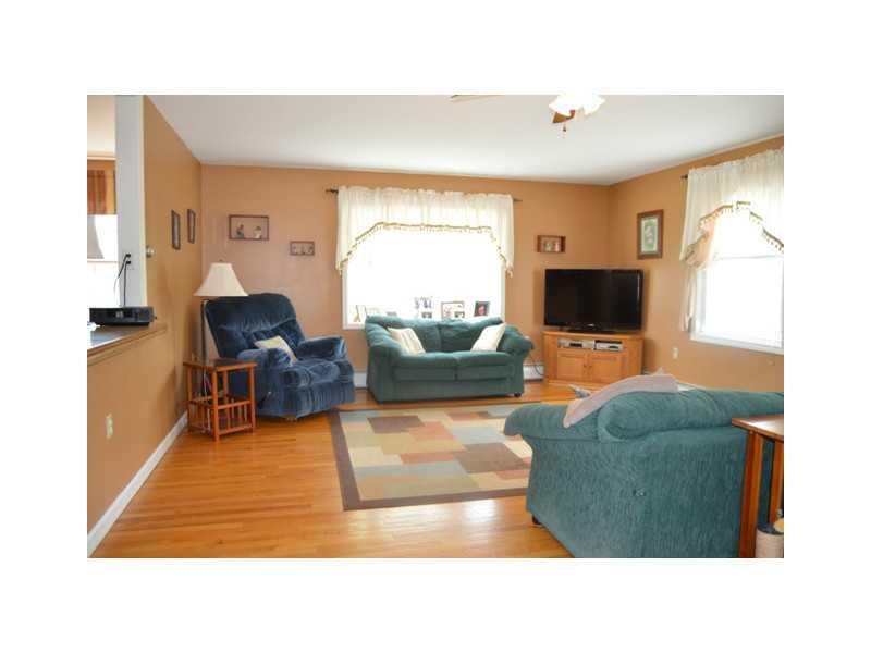 30 Mill Road North Yarmouth, ME 04097 - Photo 9 of 35 Living Room. Gleaming hardwood...