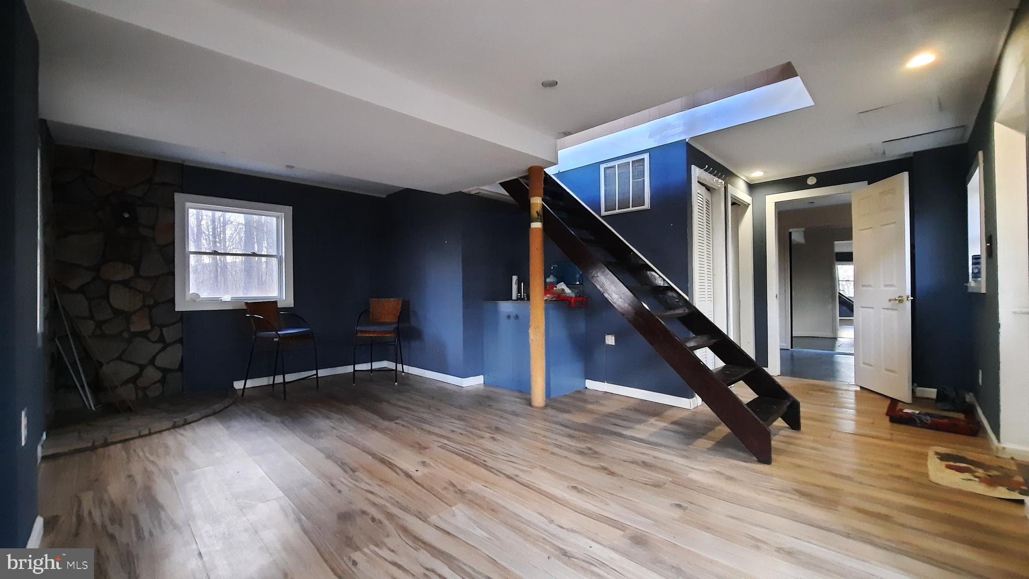 461 Chipmunk Trail Lane Linden, VA 22642 - Photo 16 of 26 a view of entryway and hall with wooden floor