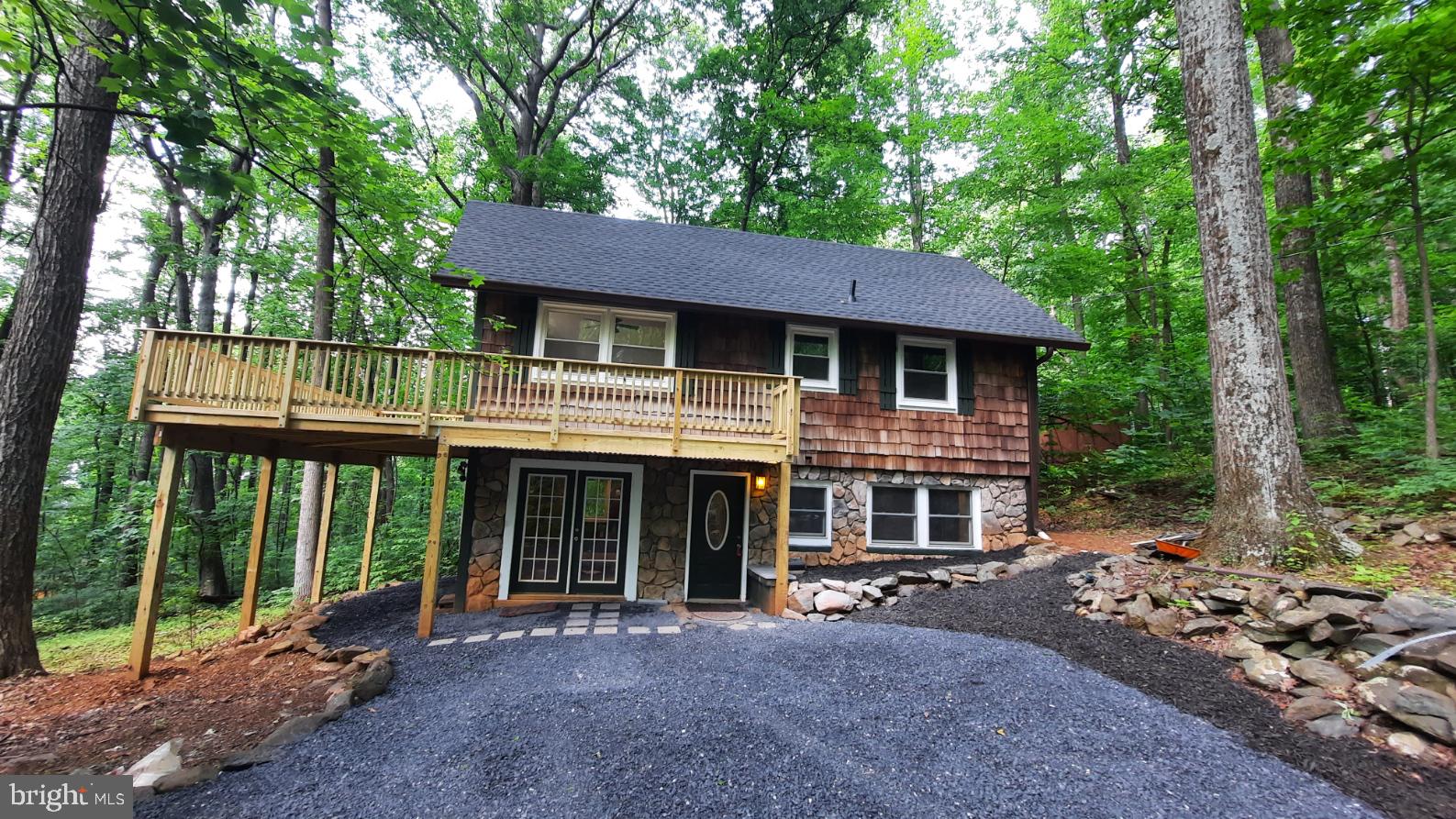 461 Chipmunk Trail Lane Linden, VA 22642 - Photo 21 of 26 a front view of a house with garden