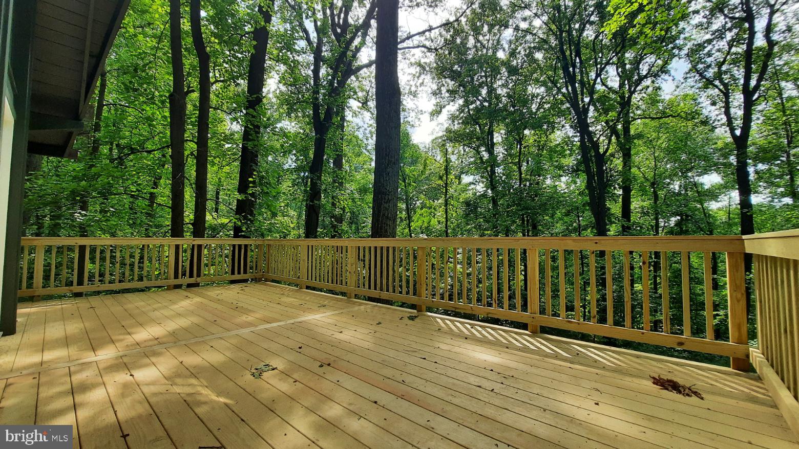 461 Chipmunk Trail Lane Linden, VA 22642 - Photo 3 of 26 a view of balcony with wooden floor and fence