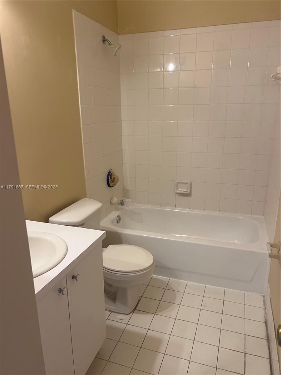 5357 Southwest 125th Avenue Miramar, FL 33027 - Photo 20 of 39 a bathroom with a sink a toilet and shower