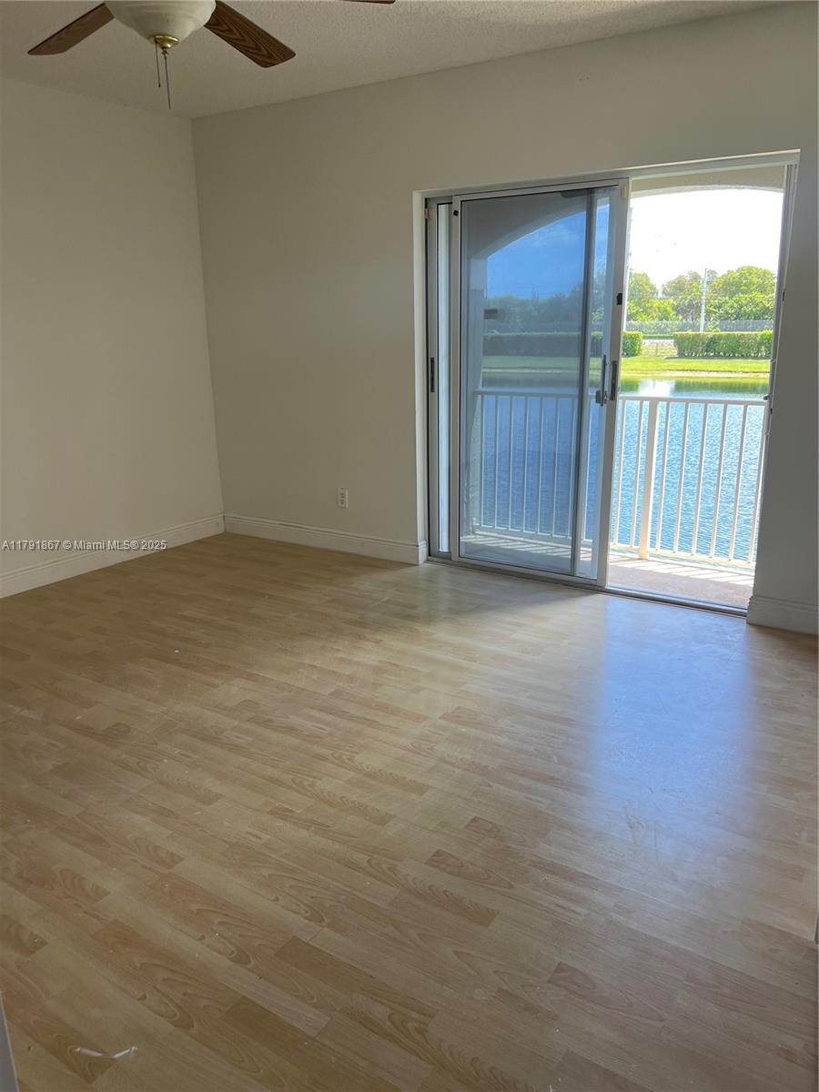 5357 Southwest 125th Avenue Miramar, FL 33027 - Photo 21 of 39 a view of an empty room with a window