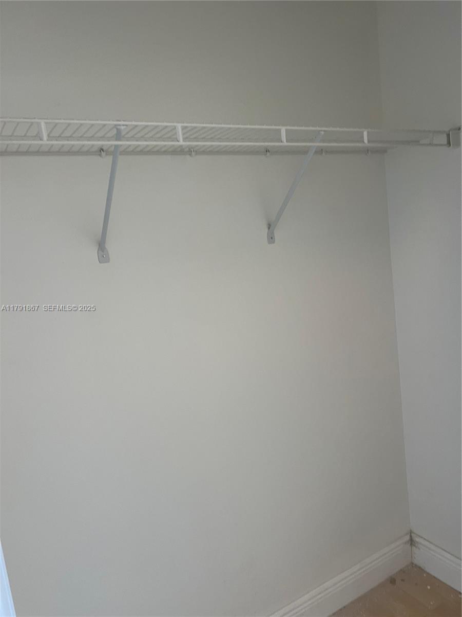 5357 Southwest 125th Avenue Miramar, FL 33027 - Photo 24 of 39 a view of a room with racks on the wall