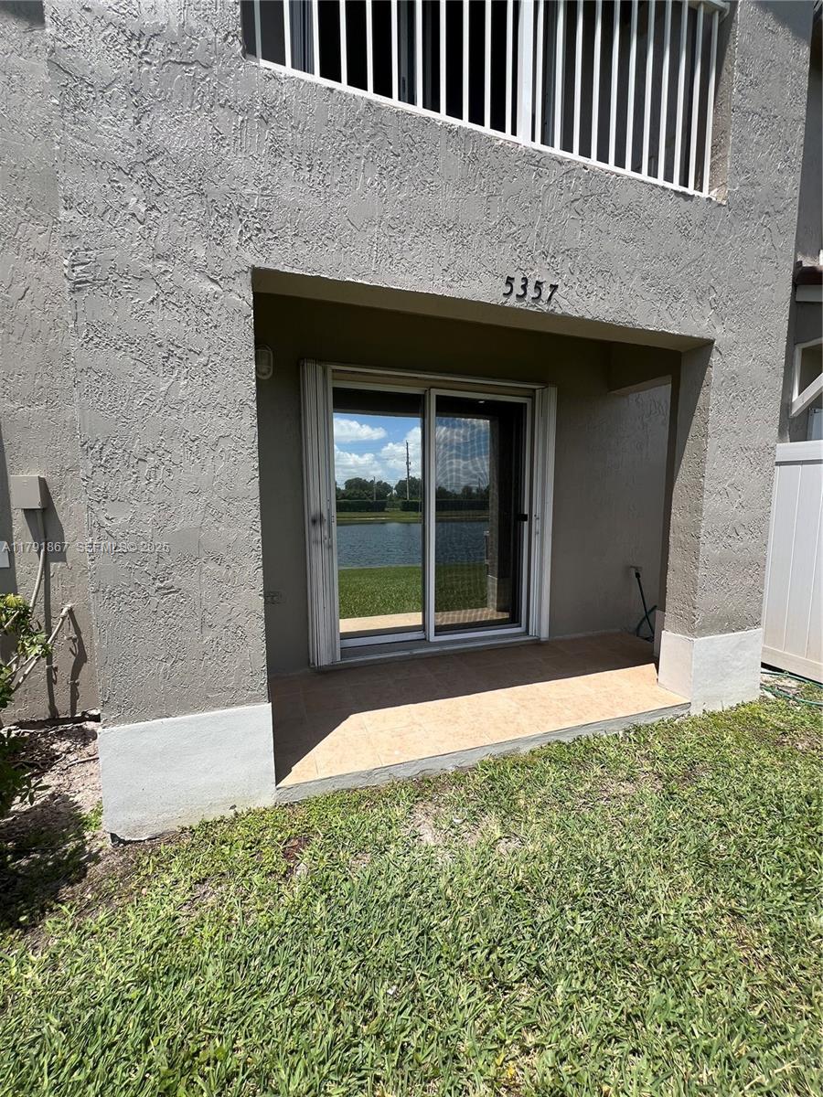 5357 Southwest 125th Avenue Miramar, FL 33027 - Photo 28 of 39 a house view with a outdoor space